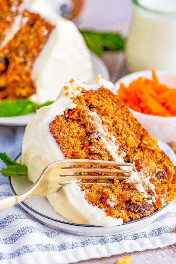 slice of carrot cake with cream cheese frosting recipes perfect for Easter dinner