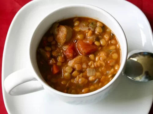 cup of sausage and lentil soup