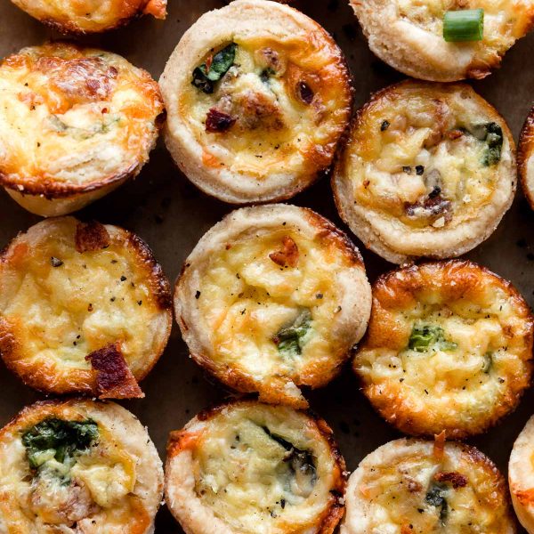 a grouping of mini quiches