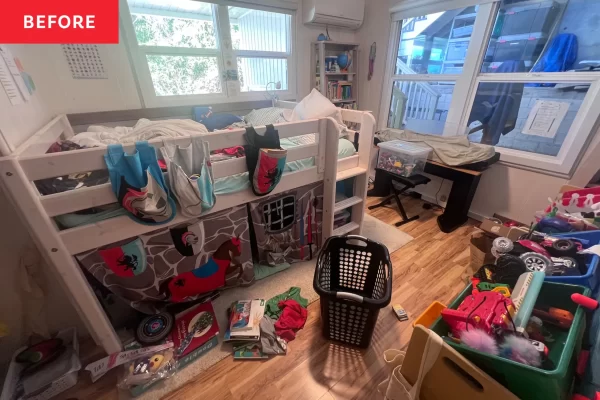 cluttered bedroom with bunk beds