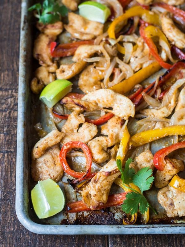 a sheet pan filled with fajitas