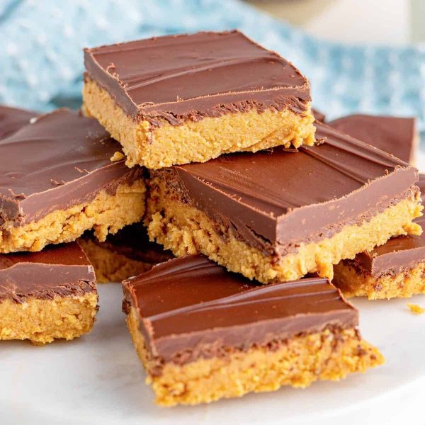peanut butter squares with chocolate on top favorite potluck recipes
